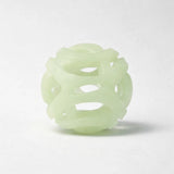 Glow in the dark breathable fetch ball on a clean studio background