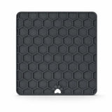 Grey silicone fun and relax lick mat on white background